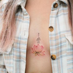 Unalome sternum tattoo with lotus by miko_nyctattoo #mikonyctattoo #unalome #lotus #watercolor #color #sternum #buddhism #buddhist #symbol