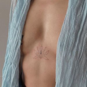 Unalome tattoo by nadi.tatts #naditatts #unalome #buddhism #buddhist #symbol #fineline #minimal #small #sternum #dotwork #lotus #flower