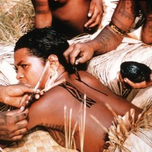 1958 image of a Motuan female tattooing the back of a young woman in Manu Manu, Papua New Guinea. Photo by Percy Cochrane, 1907-1980. Part of the University of Wollongong Archives. Via Vanishing Tattoo #tattootools #tattoosupplies #tattoohistory #tattoocu