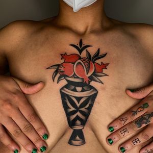 Tattoo by Sema Dayoub #semadayoub #nassimdayoub #traditionaltattoo #qttr #queertattooer  #darkskintattoo #darkskinbodyart #vase #pomegranate #floral #pattern #chest