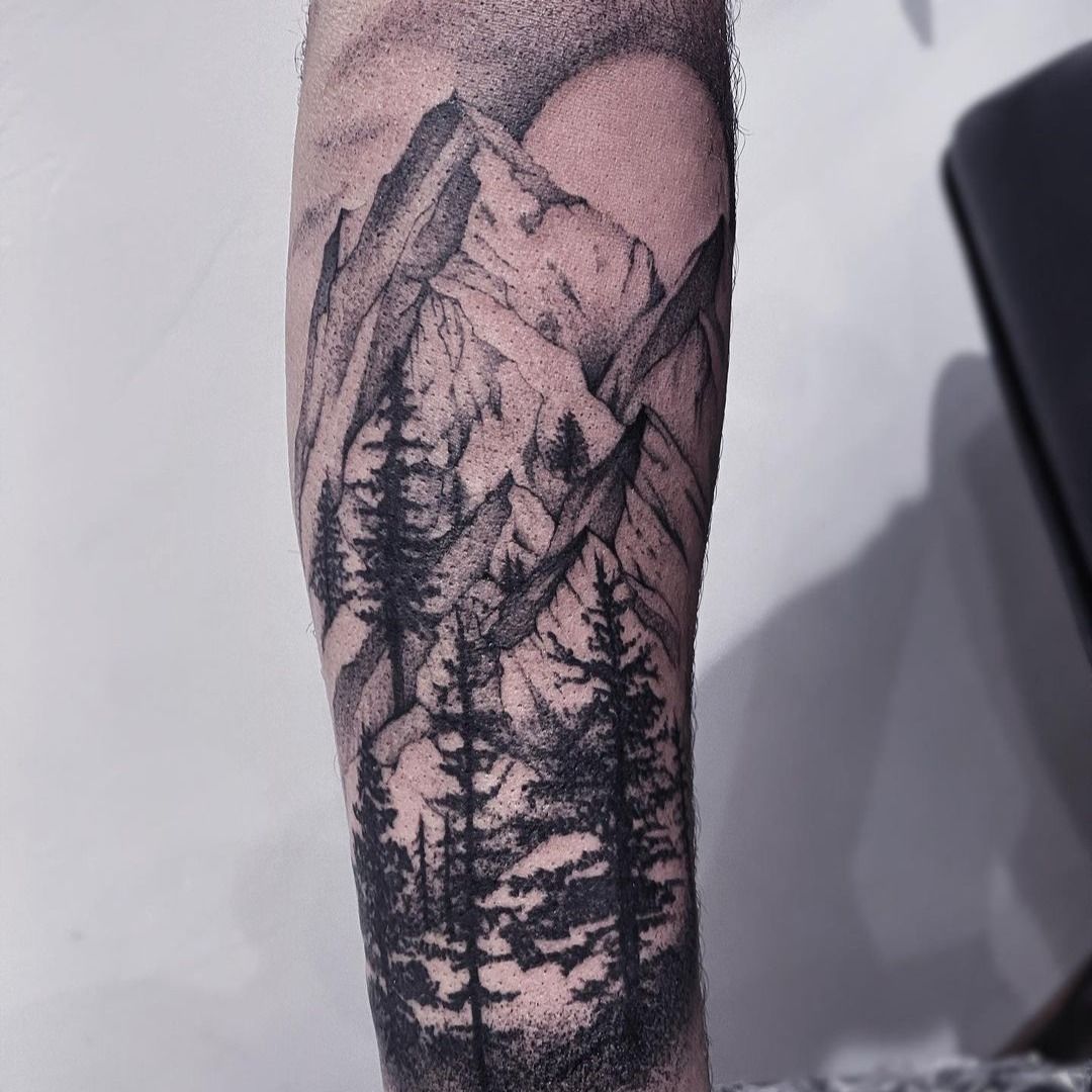Tattoo uploaded by Tattoodo  Mountain tattoo by audenita audenita  landscapetattoo landscape nature mountain trees sun dotwork   Tattoodo