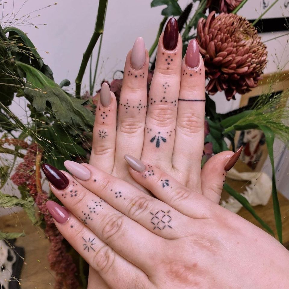 Handpoke tattoos by Slow Pokes at Parliament Tattoo in London.