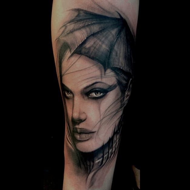 10 Enticing And Fierce Angelina Jolie Tattoos • Tattoodo