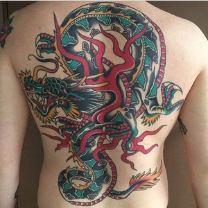 Coleman Dragon Tattoo by @krakhouse #coleman #colemantattoo #capcoleman #colemandragon #traditionaldragon #colemandragontattoo #traditionaldragintattoo #oldschooldragon #krakhouse