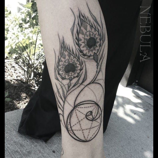 You can hide it in any design. Can you spot it in this tattoo by Ashlie Nebula?
