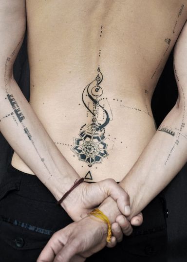 12 Ideas for Refined Spine Tattoos