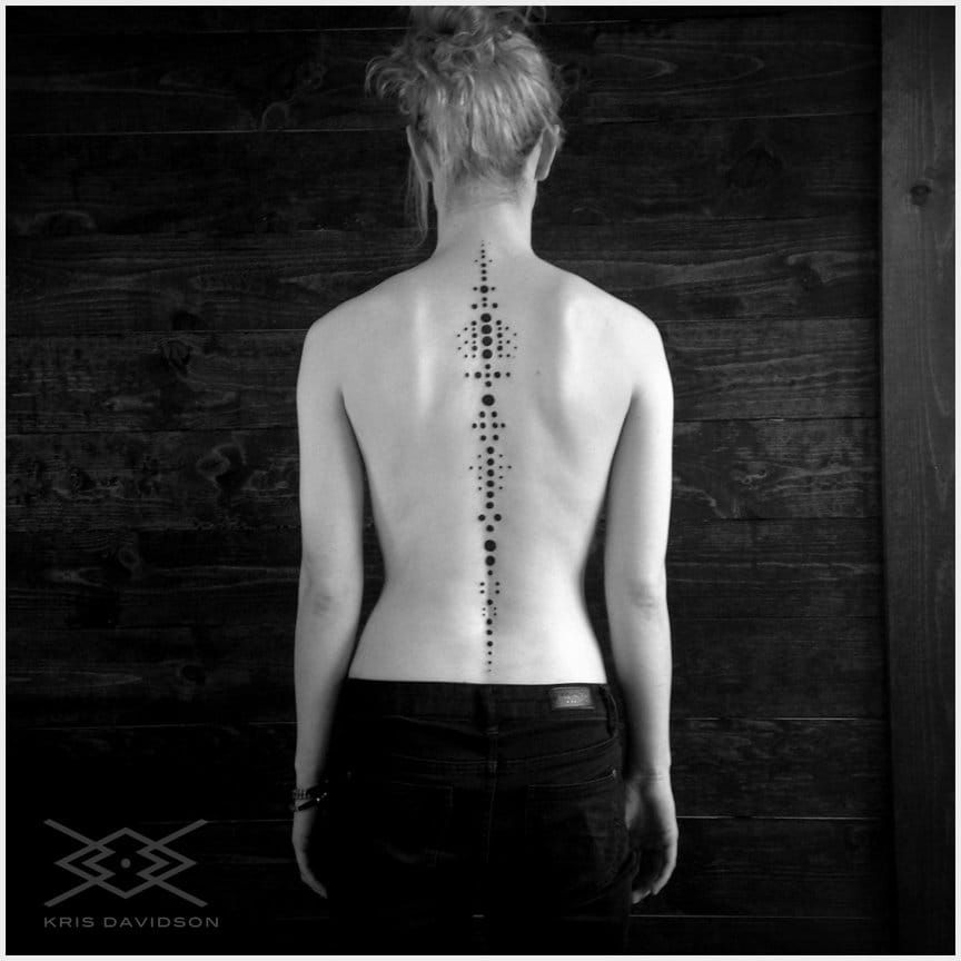 Geometry inspired spine tattoos in blackwork look amazing. Less is more: by Kris Davidson. #blackwork #dots #krisdavidson