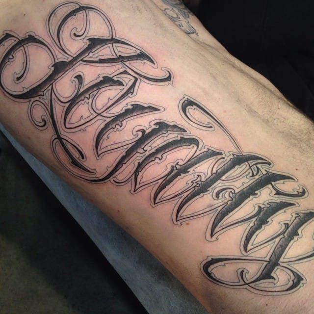 fancy lettering tattoo