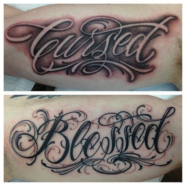elaborate lettering tattoo