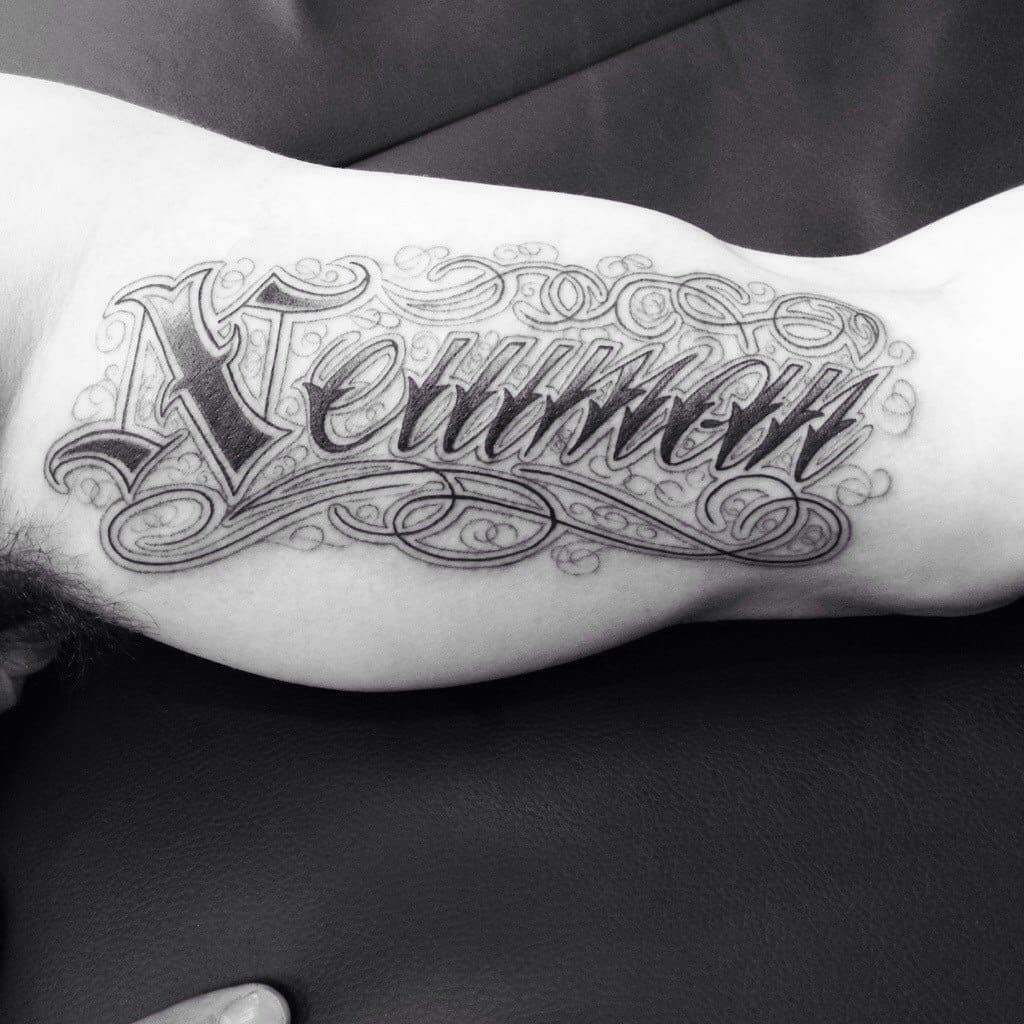 fancy lettering tattoo