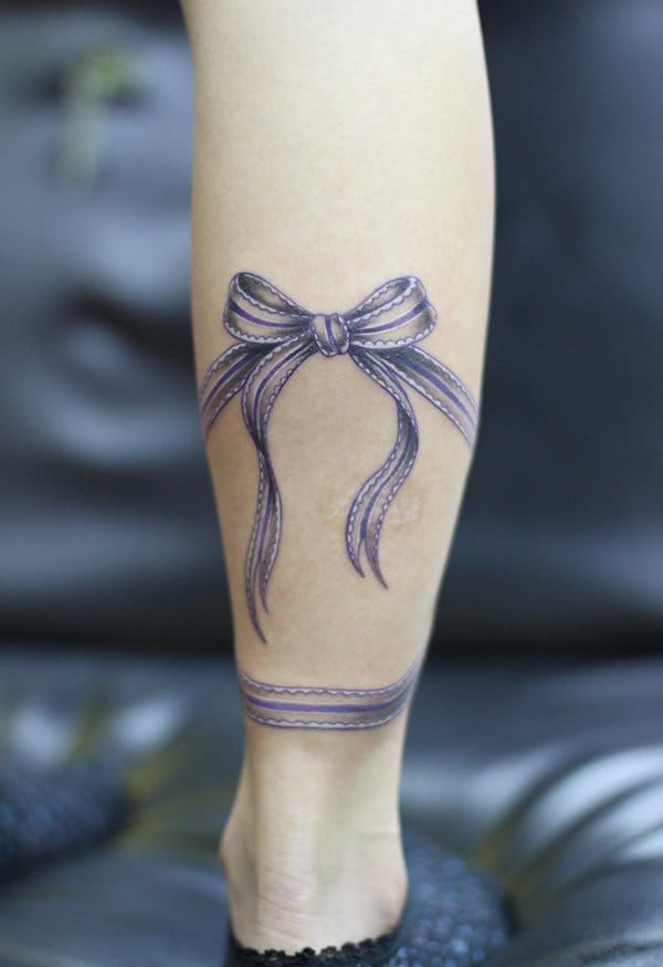 15 Frilly and Meaningful Bow Tattoos • Tattoodo