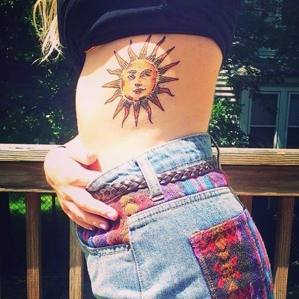 psychedelic sun tattoo