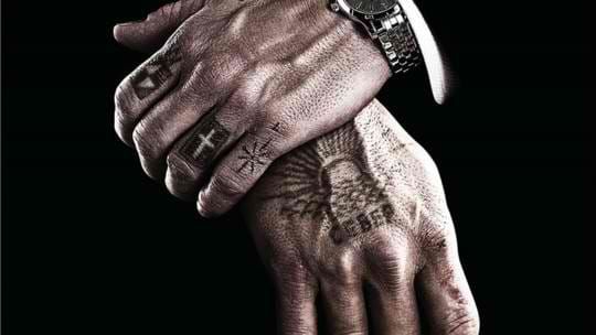 Classy finger tattoo, artist unknown.