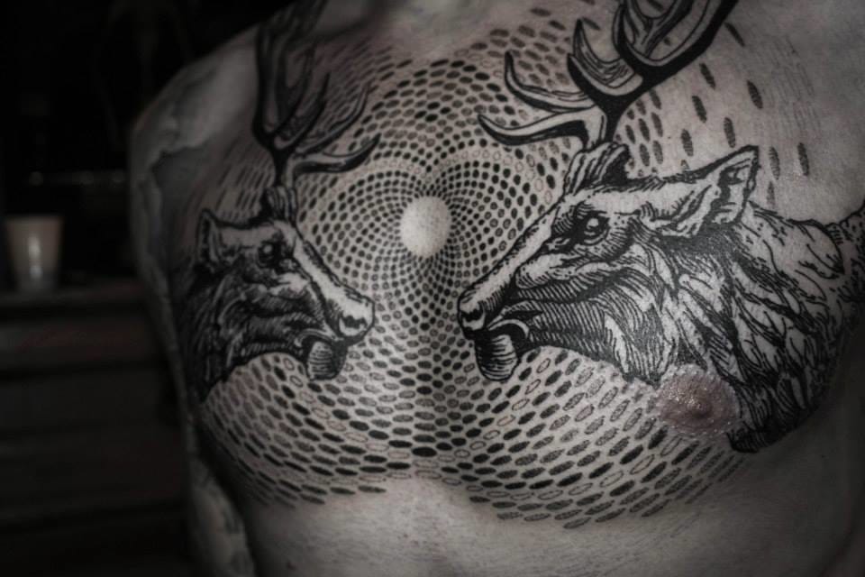Cool geometric chestpiece with deer tattoo by Alexis Calvié. #chestpiece #stag #deer #AlexisCalvie