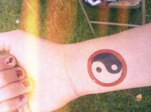 Creative yin yang tattoo, Artist unknown.