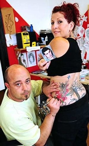 Kim Mordue had her sons ashes incorporated into her back tattoo