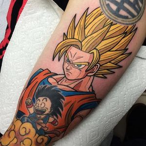 Super Saiyan Goku and Kid Goku tattoo by Adam Perjatel. #AdamPerjatel #anime #dragonball #dbz #dragonballz