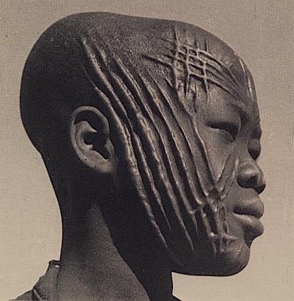Face scarification, There's no bullying this kid in school. Seriously though, a boy?! Such wow!
