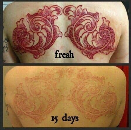 Crazy body modification, Stages of healing. This design performed by Richard Ivey