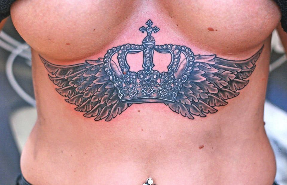 08 amazing owl wings under breast tattoo  Tattoo Designs for Women