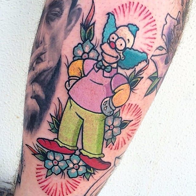 Krusty the Clown tattoo done on the thigh embroidery