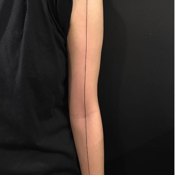 line tattoos around arm meaning