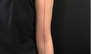 The Skill of the Single Black Line Tattoo