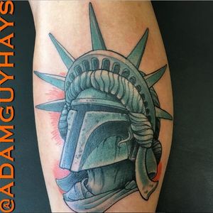 A fantastic tattoo of Boba Fett as the Statue of Liberty by Adam Guy Hays (IG—adamguyhays). #AdamGuyHays #NYC #RedRocketTattoo #RogueOne #StarWars #StarWarsDay