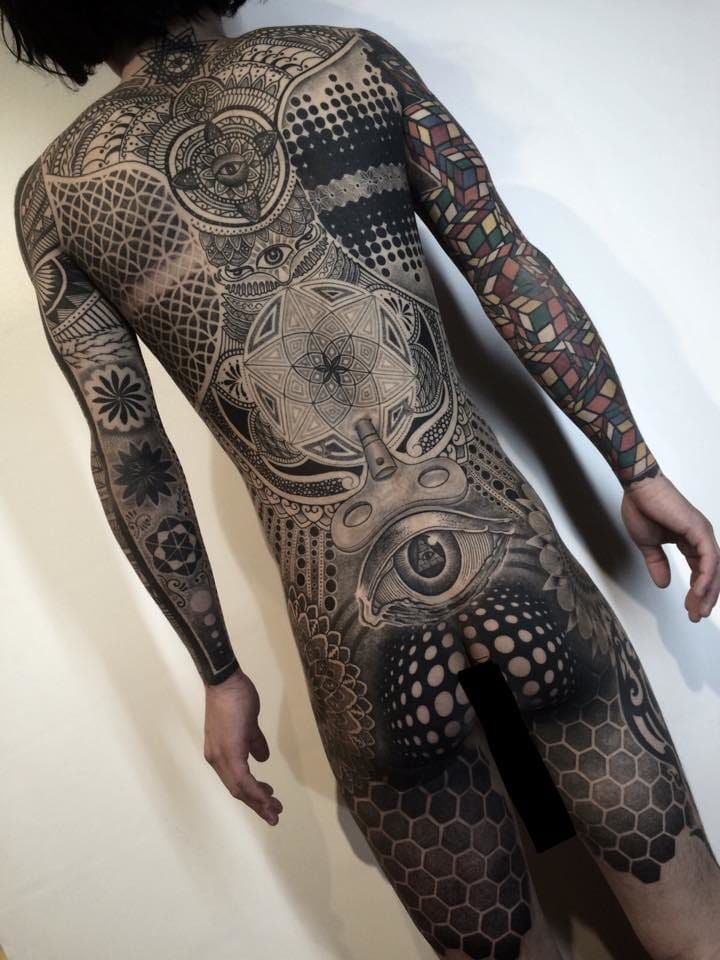 Tattoo artist Nissaco almost broke the internet with his out of this world geometric bodysuit.