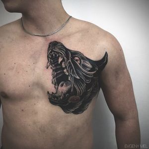 Better not anger the wolf on his skin, nor the one inside that chest! Tattoo by Evgeny Mel