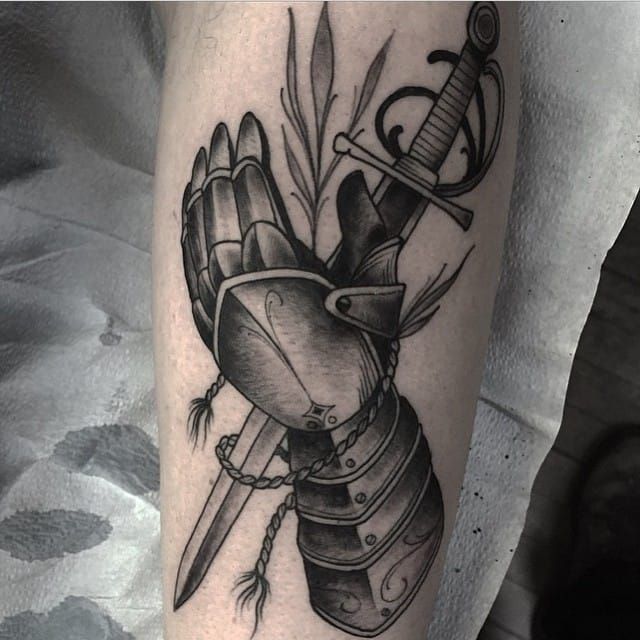 Cool armor gauntlet and sword. Can you credit the artist please?