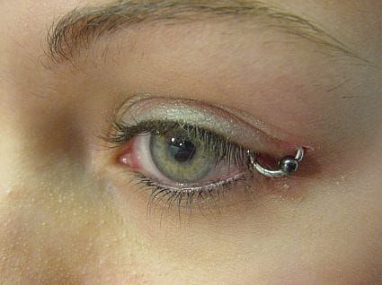 Crazy eyelid piercing
