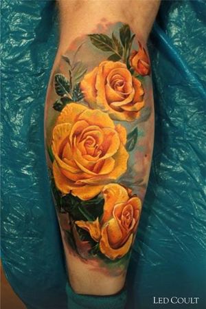 Outstanding calf flower tattoo by Led Coult