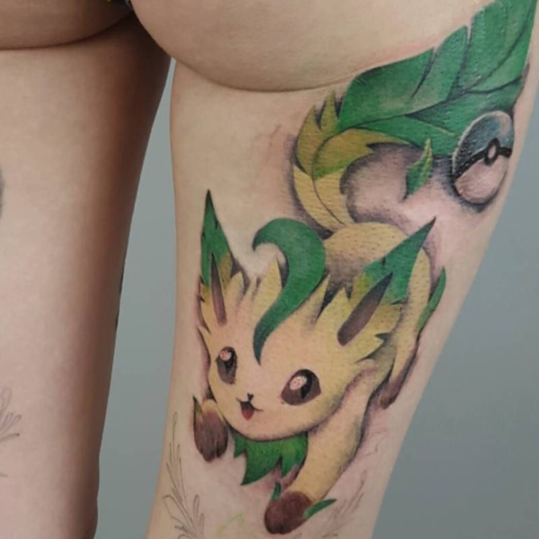 Ariana Grande has a tattoo of Eevee on her left arm  Pokémon Blog