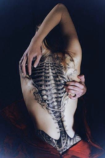 Realistic 3D tattoo, artist unknown.
