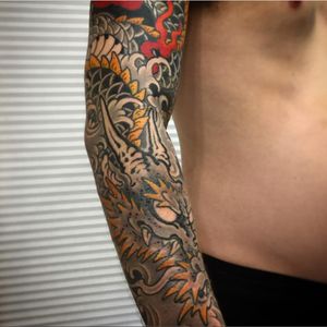 A Japanese dragon tattoo sleeve in progress by Horitomo (IG—horitomo_stateofgrace). #dragon #Horitomo #Irezumi #Japanese #traditional
