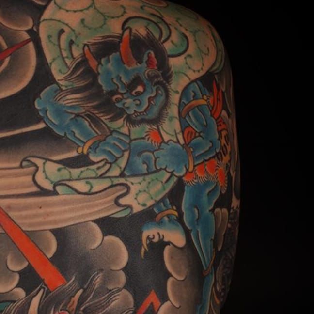 Neo Japanese Raijin tattoo on the right forearm