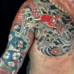 A fearsome red dragon topping off a sleeve by Crez (IG—crez_adrenalink). #Crez #dragon #Irezumi #Japanese #traditional