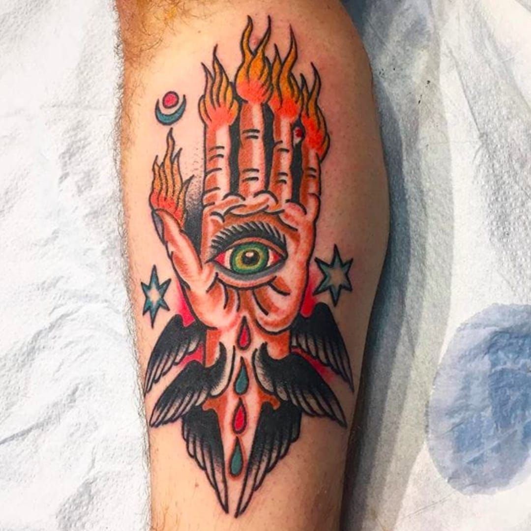traditional hand eye tattoo