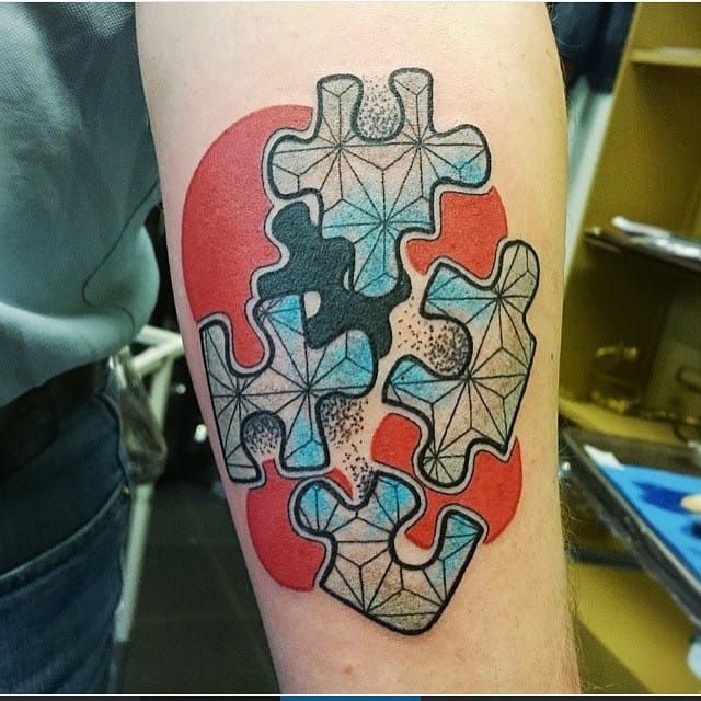 Puzzle Piece Tattoos The Ultimate Guide for Puzzle Nerds  Cloudberries
