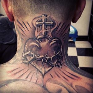 Black and grey nape tattoo by Steve Soto.