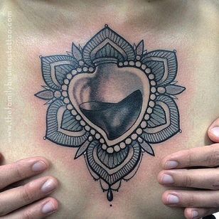 Nice chest tattoo by Miss Juliet.