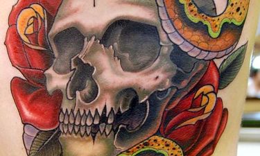 15 Potent Skull And Snake Tattoos