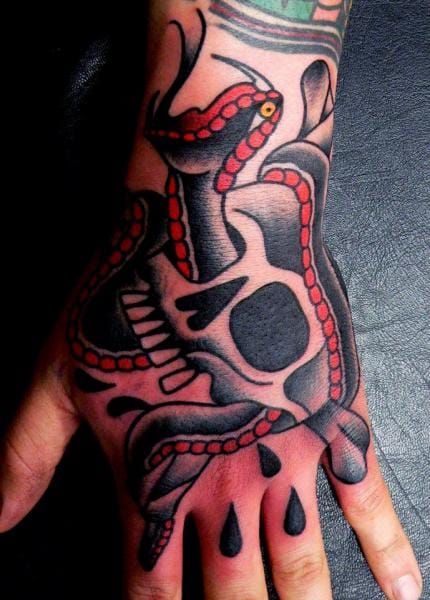 Hand snake skull by Last Port Tattoo