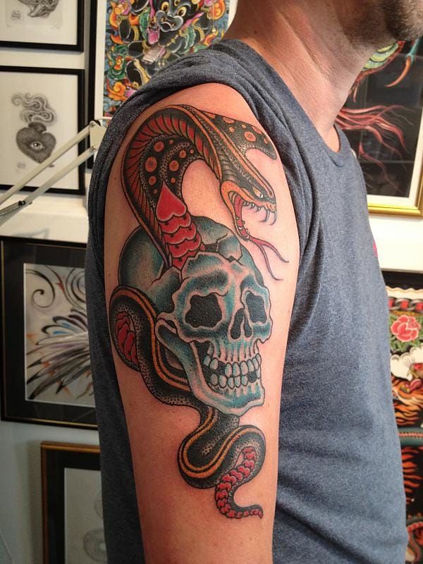 Fantastic shoulder skull and snake by Last Sparrow Tattoo