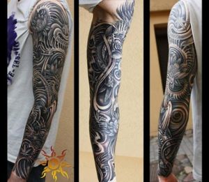 Black and grey sleeve by Ramas Tattoo