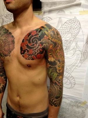 Chest and sleeve by Seventh Son Tattoo