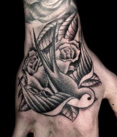 Swallow tattoo on the hand, artist unknown #swallow #swallows #bird #blackwork #traditional #blackAndWhite