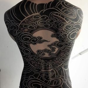 Blackwork tattoo by Gakkin #Gakkin #besttattoos #blackwork #backpiece #sun #moon #clouds #pattern #darkart #geometric #circles #tattoooftheday