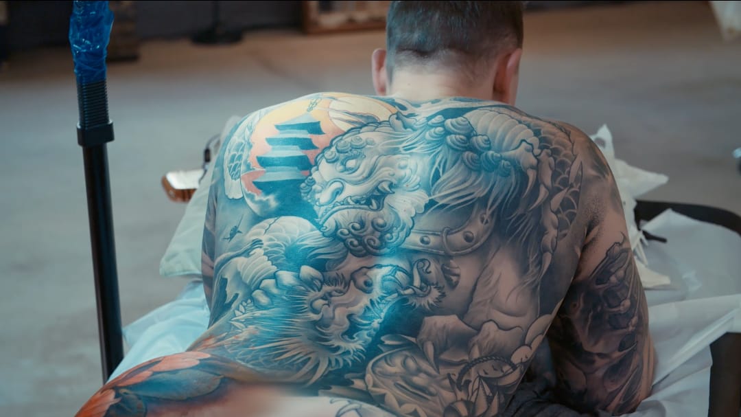 Bodysuit in progress by Christopher Henriksen #residentartists #thetattooshop #miami #wynwood #tvseries #facebookwatch #bodysuit #dragon #protector #guardian #deity #fudog #foodog #blackandgrey #pagoda #Japanese #NeoJapanese
